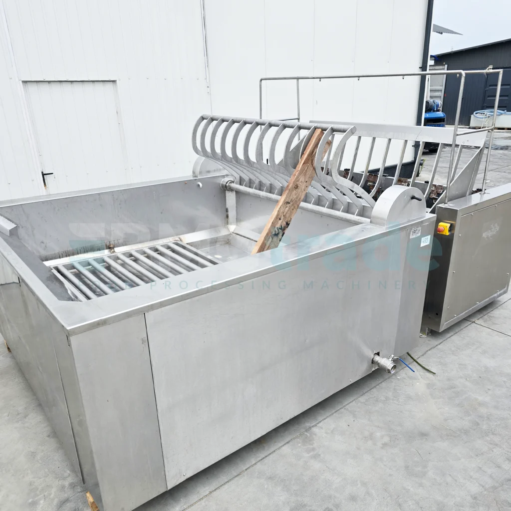 Gantry dehairer and immersion scalder with ejection NIRO-TECH