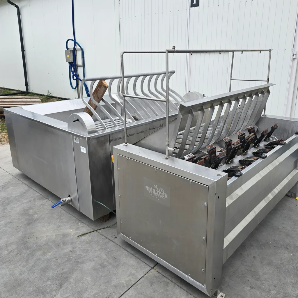 Gantry dehairer and immersion scalder with ejection NIRO-TECH