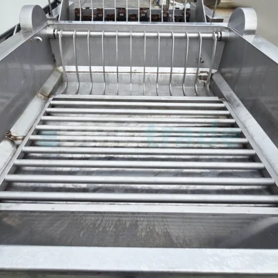 Gantry dehairer and immersion scalder with ejection NIRO-TECH